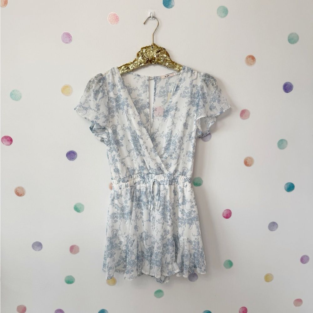 Francesca's Collections Blue and White Floral Romper